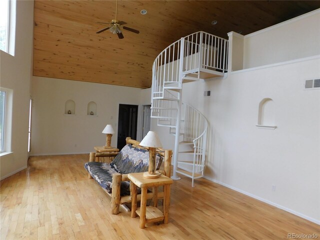 11003 US Highway 160, Del Norte, CO 81132 - sitting room featuring high vaulted ceiling, wood ceiling, stairs, wood finished floors, and a ceiling fan