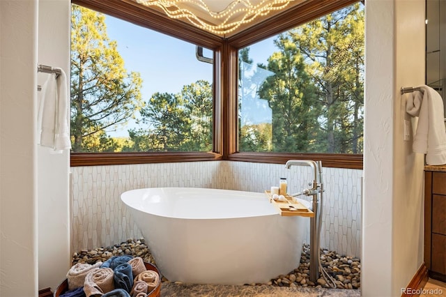 full bath with a soaking tub