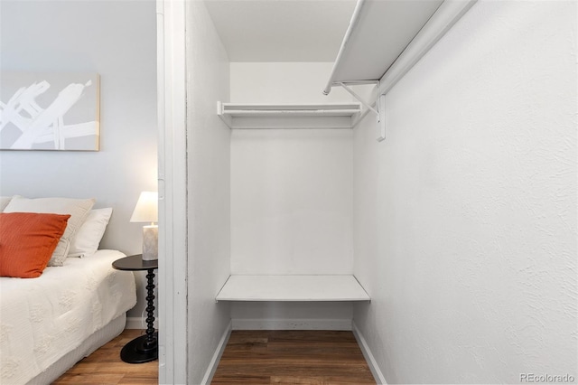 1820 Newland Ct Unit 310, Lakewood, CO 80214 - walk in closet featuring wood finished floors
