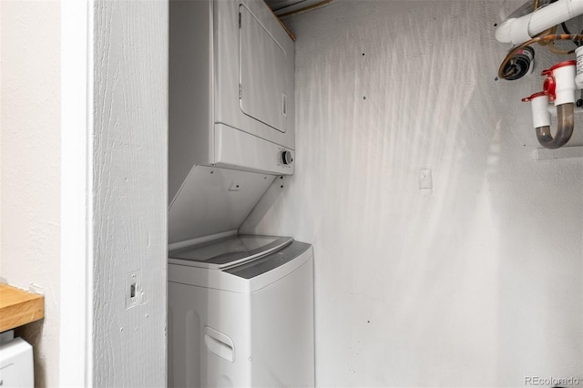 1820 Newland Ct Unit 310, Lakewood, CO 80214 - laundry area with stacked washer / dryer