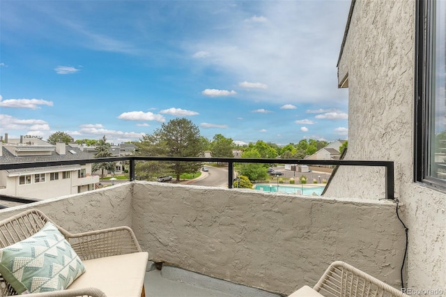 1820 Newland Ct Unit 310, Lakewood, CO 80214 - balcony featuring view of pool area