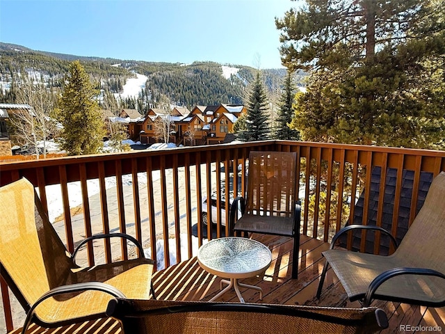 balcony with a residential view and a mountain view