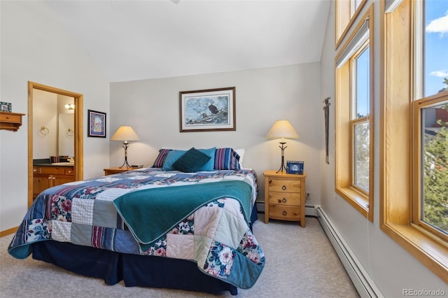 bedroom featuring lofted ceiling, baseboard heating, multiple windows, and carpet floors