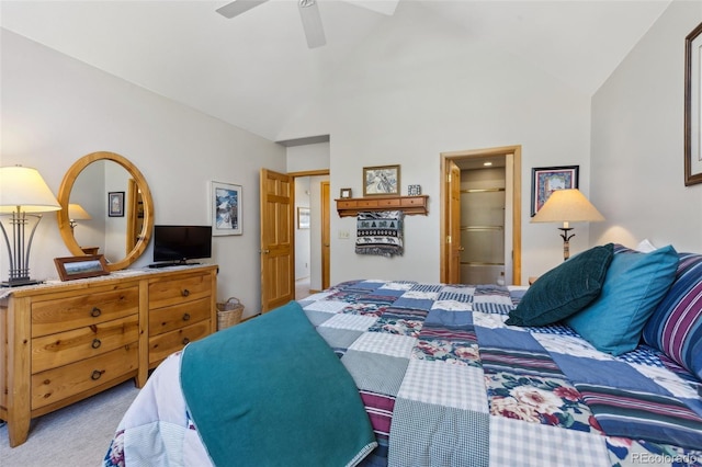 carpeted bedroom featuring ceiling fan and vaulted ceiling