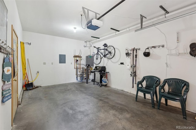 garage with electric panel and a garage door opener