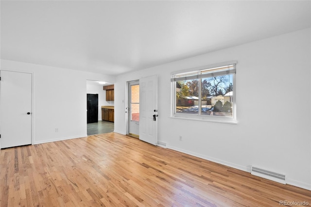 interior space with light hardwood / wood-style flooring