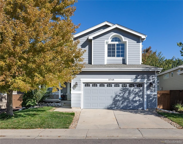 view of property featuring a garage