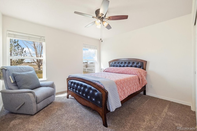 56330 E 37th Ct, Strasburg, CO 80136 - bedroom featuring ceiling fan, carpet flooring, baseboards, and multiple windows