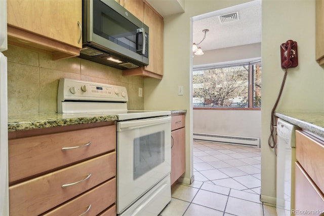 kitchen featuring a baseboard heating unit, visible vents, white appliances, light countertops, and light tile patterned floors