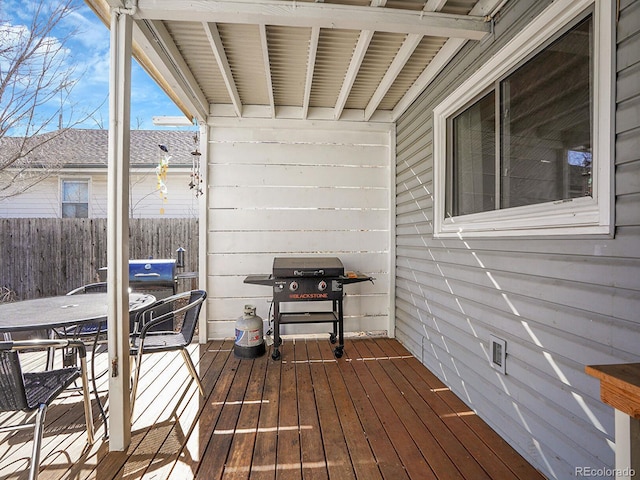 wooden terrace with grilling area