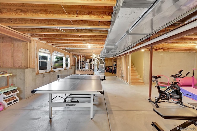 basement featuring stairs