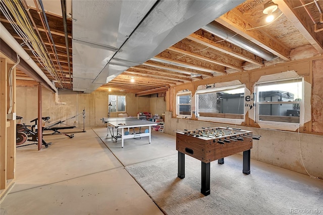 rec room featuring concrete flooring