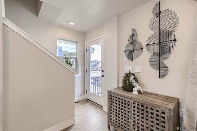 128 E Douglas St, Superior, CO 80027 - entrance foyer featuring baseboards, stairs, recessed lighting, and light wood-style floors