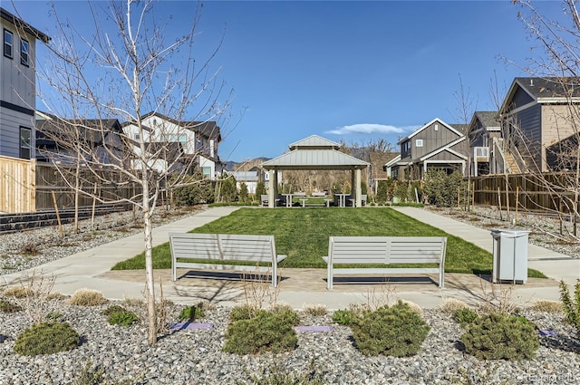 view of community with a gazebo and a yard