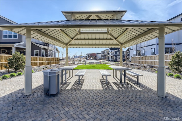 view of home's community with a gazebo and a patio area