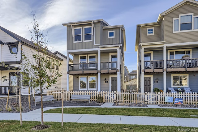 view of front of property with a balcony