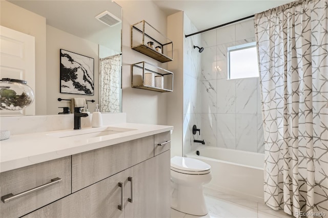 128 E Douglas St, Superior, CO 80027 - full bathroom featuring vanity, shower / bath combo with shower curtain, toilet, and marble finish floors
