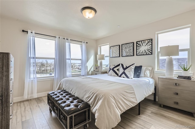 128 E Douglas St, Superior, CO 80027 - bedroom with light wood finished floors and baseboards