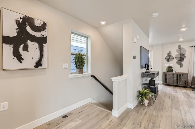 128 E Douglas St, Superior, CO 80027 - hall with an upstairs landing, wood finished floors, baseboards, and recessed lighting