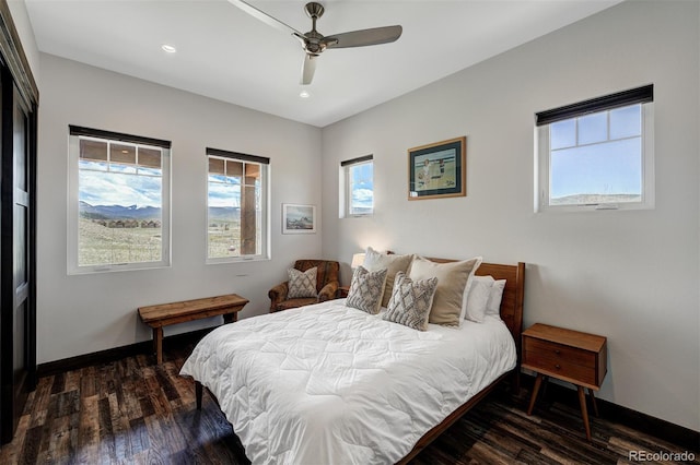 701 Saddle Ridge Cir, Granby, CO 80446 - bedroom with wood finished floors, baseboards, recessed lighting, and ceiling fan