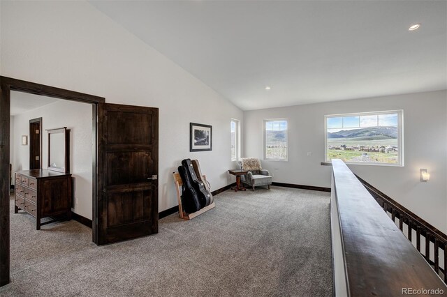 701 Saddle Ridge Cir, Granby, CO 80446 - living area with carpet, baseboards, recessed lighting, high vaulted ceiling, and an upstairs landing
