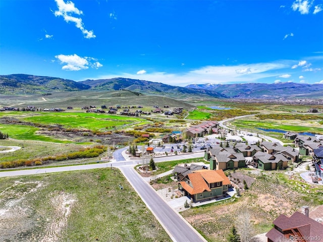 701 Saddle Ridge Cir, Granby, CO 80446 - aerial perspective of suburban area with a mountainous background
