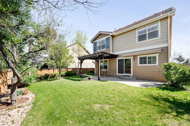 rear view of house with a pergola and a patio