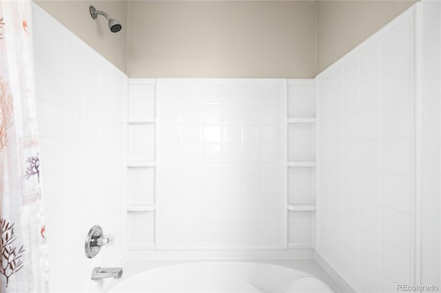 full bathroom featuring shower / bath combo with shower curtain
