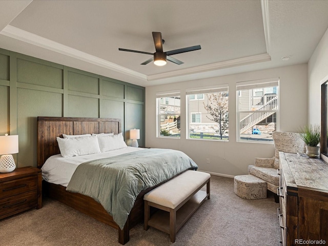 27110 E Fremont Pl, Aurora, CO 80016 - bedroom featuring a tray ceiling, carpet, and ceiling fan