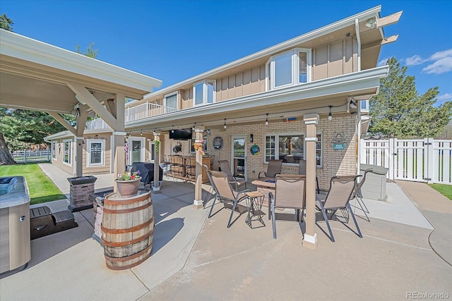 view of patio / terrace featuring ceiling fan