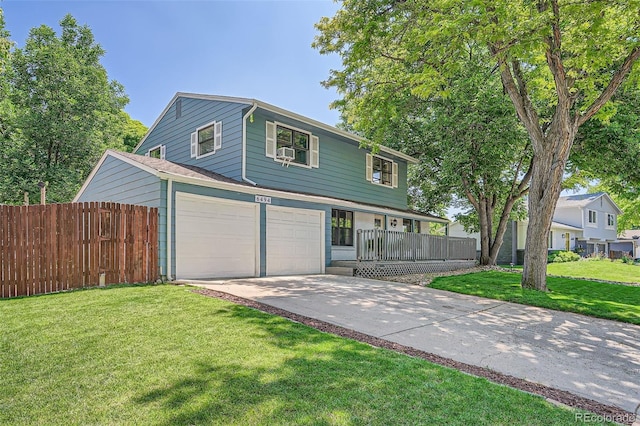 6494 W 85th Ave, Arvada, CO 80003 - view of front of house with driveway, a porch, and an attached garage