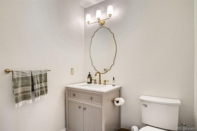 6494 W 85th Ave, Arvada, CO 80003 - half bathroom featuring vanity and toilet