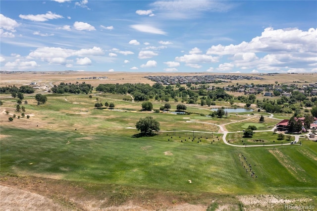 aerial view featuring a water view and view of golf course
