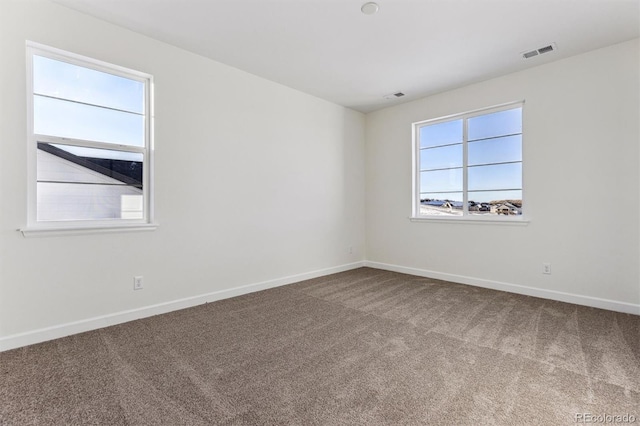 spare room with carpet flooring