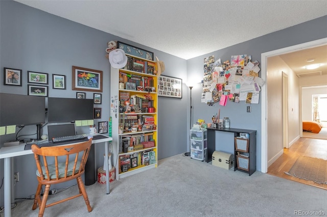 home office featuring light carpet