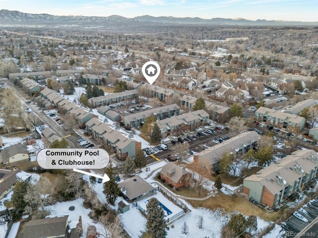 birds eye view of property featuring a mountain view