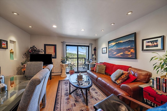 31270 John Wallace Rd Unit 310, Evergreen, CO 80439 - living area featuring recessed lighting, wood finished floors, and baseboard heating