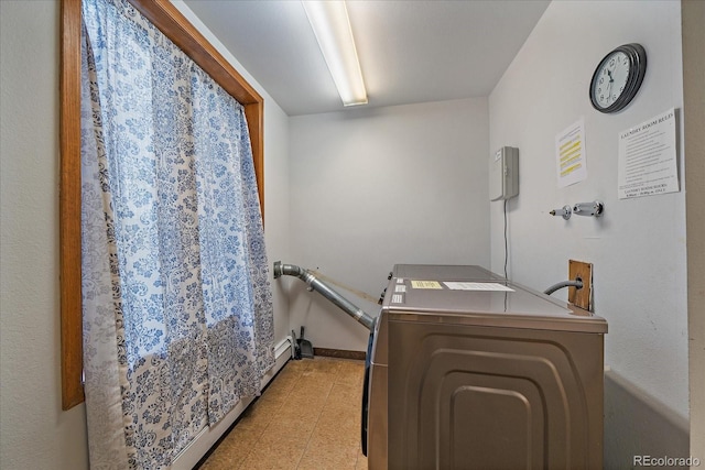 31270 John Wallace Rd Unit 310, Evergreen, CO 80439 - laundry area featuring hookup for a washing machine and baseboards
