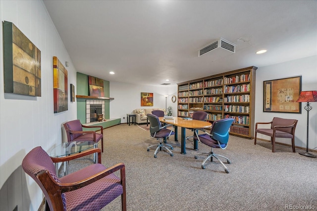 31270 John Wallace Rd Unit 310, Evergreen, CO 80439 - office space featuring carpet, a fireplace with raised hearth, recessed lighting, and baseboards
