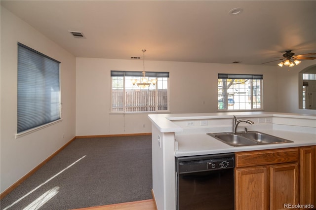 kitchen with black dishwasher, sink, carpet, decorative light fixtures, and ceiling fan with notable chandelier