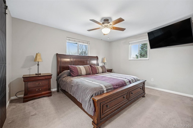 7636 S Eaton Way, Littleton, CO 80128 - bedroom featuring multiple windows, light colored carpet, and ceiling fan