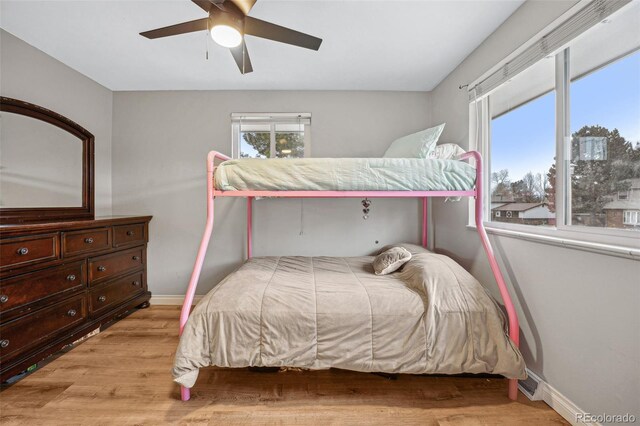 bedroom featuring ceiling fan and light hardwood / wood-style floors