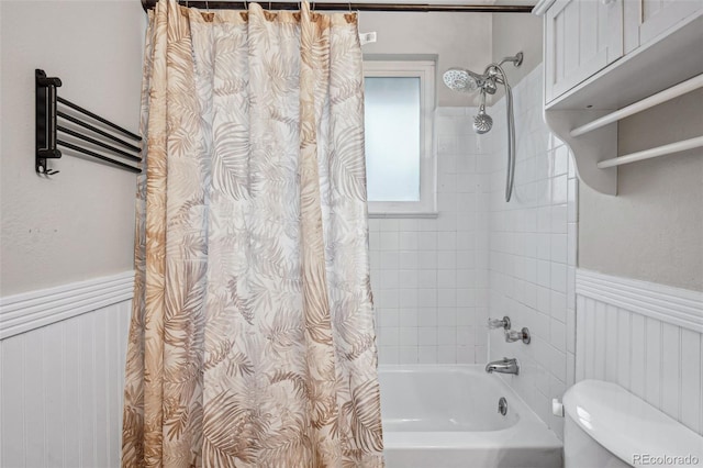 7636 S Eaton Way, Littleton, CO 80128 - full bathroom featuring shower / bath combination with curtain and wainscoting