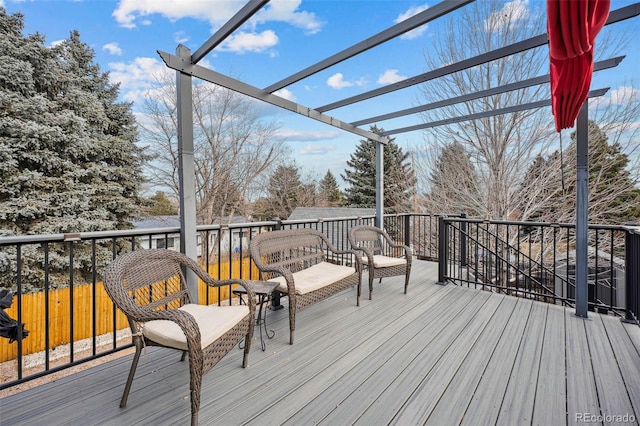 wooden deck featuring a pergola