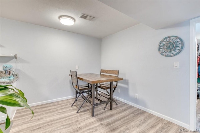 5300 E Cherry Creek S Drive 804, Denver, CO 80246 - dining area with wood finished floors and baseboards
