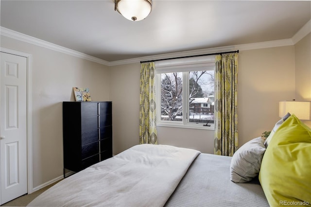 bedroom featuring crown molding