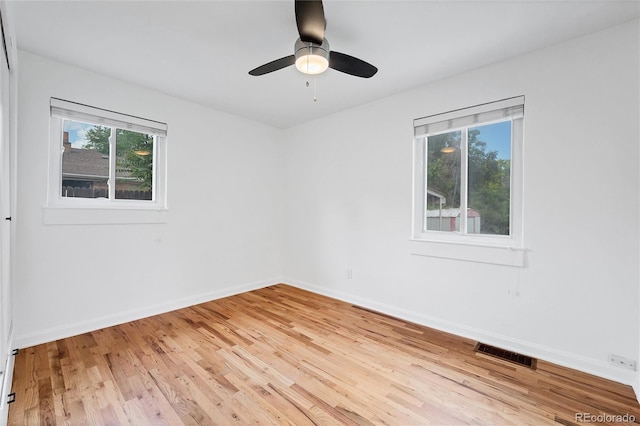 6765 W 33rd Ave, Wheat Ridge, CO 80033 - empty room with light wood-type flooring and a ceiling fan