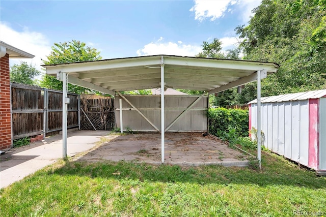 6765 W 33rd Ave, Wheat Ridge, CO 80033 - view of yard with a detached carport and a storage unit