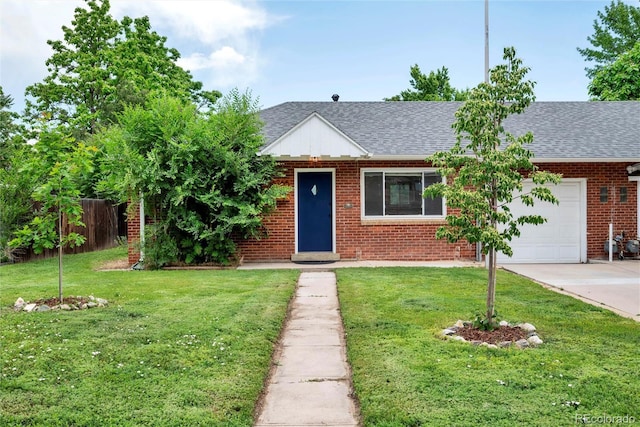 6765 W 33rd Ave, Wheat Ridge, CO 80033 - view of front of property featuring roof with shingles, a garage, driveway, and brick siding
