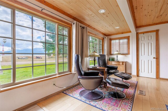 39 Granada Ct, Silver Cliff, CO 81252 - sitting room featuring wooden ceiling, wood-type flooring, recessed lighting, baseboards, and crown molding